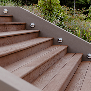 Grand staircase with Millboard Coppered Oak and LED step lights