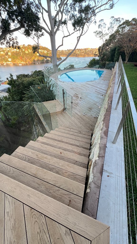Split-level deck and staircase overlooking pool and Middle Harbour - Castlecrag Sydney