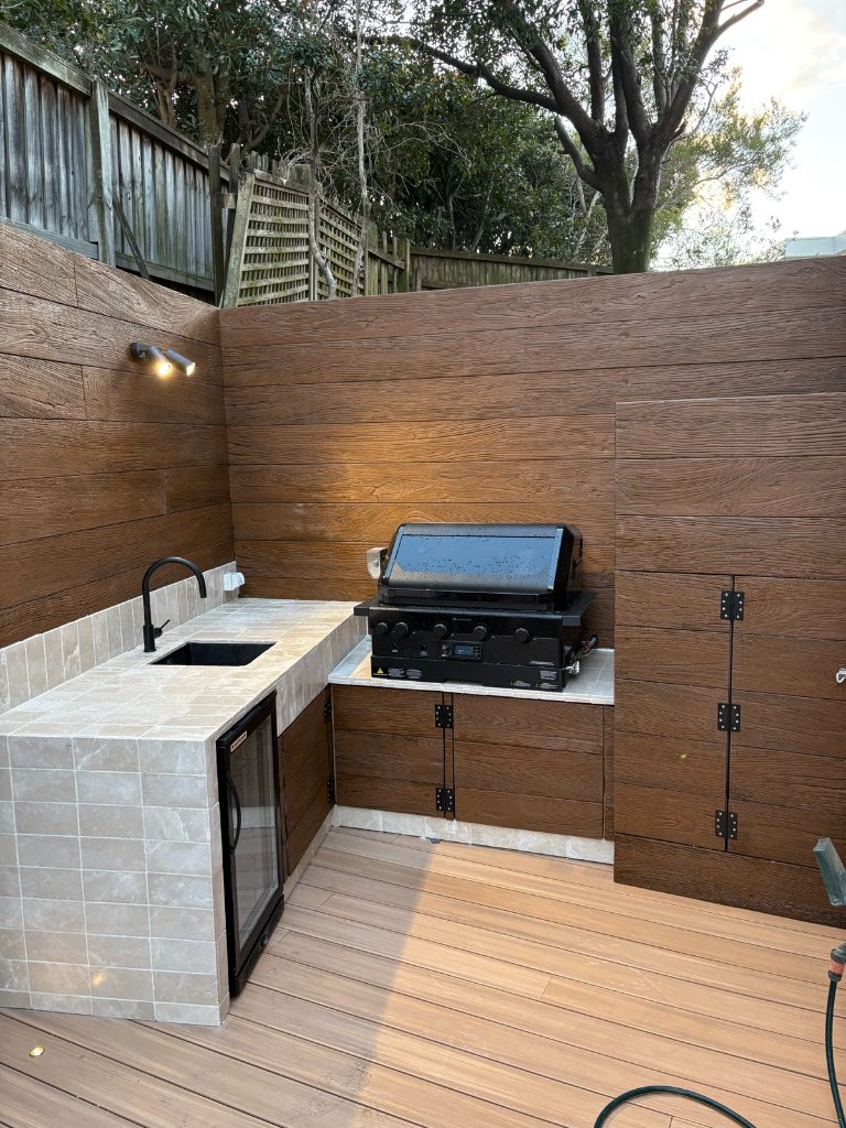 Custom outdoor kitchen with composite cladding and tiled benchtop Sydney