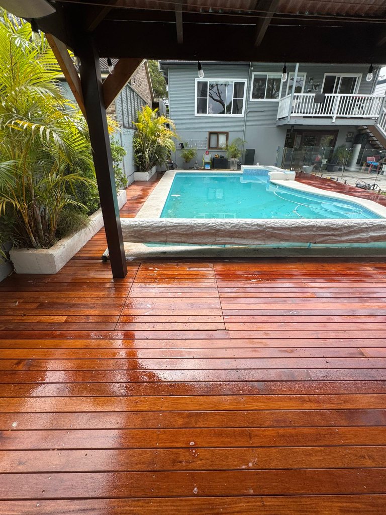 Merbau pool deck under pergola with glass balustrade - Wahroonga Sydney
