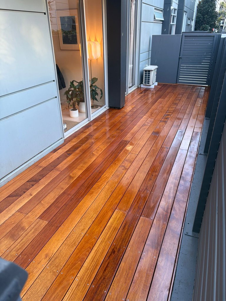 Freshly oiled Merbau timber deck showing rich natural colour