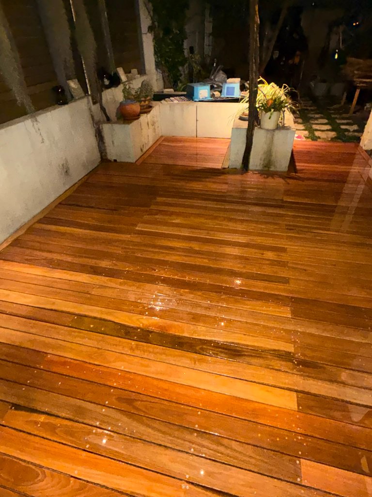 Completed Spotted Gum courtyard deck with concrete garden bed borders